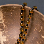 Chapelet Sainte Famille avec perles marron foncé