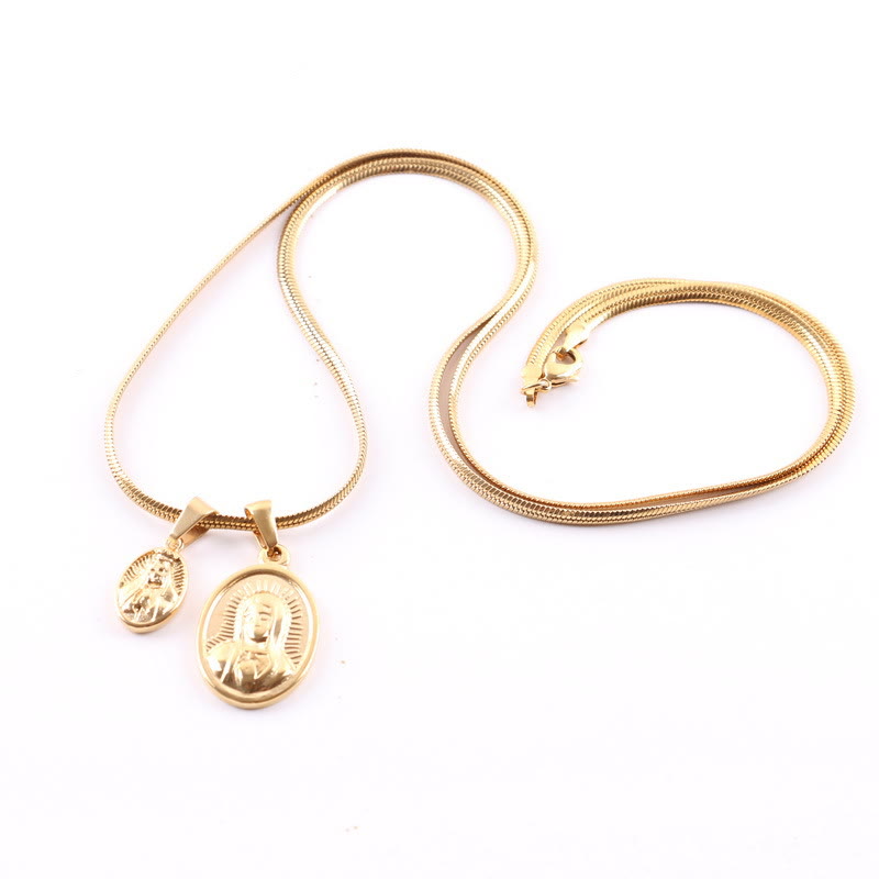 Collier en or double pendentif Notre-Dame rond